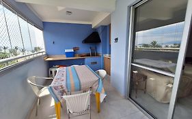 Apto em Bertioga , pé na areia